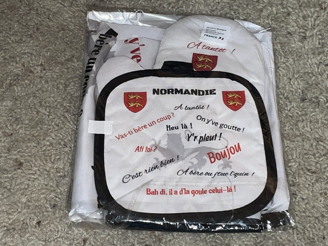 Tablier avec des expressions normandes
