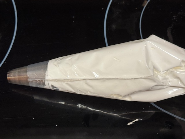 Meringue dans une poche à douille