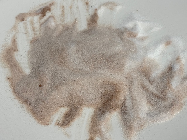 Sucre et cannelle mélangés