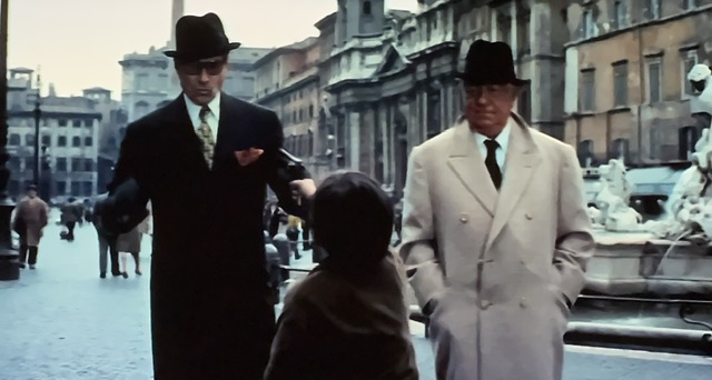 Les truands affrontent un garçon