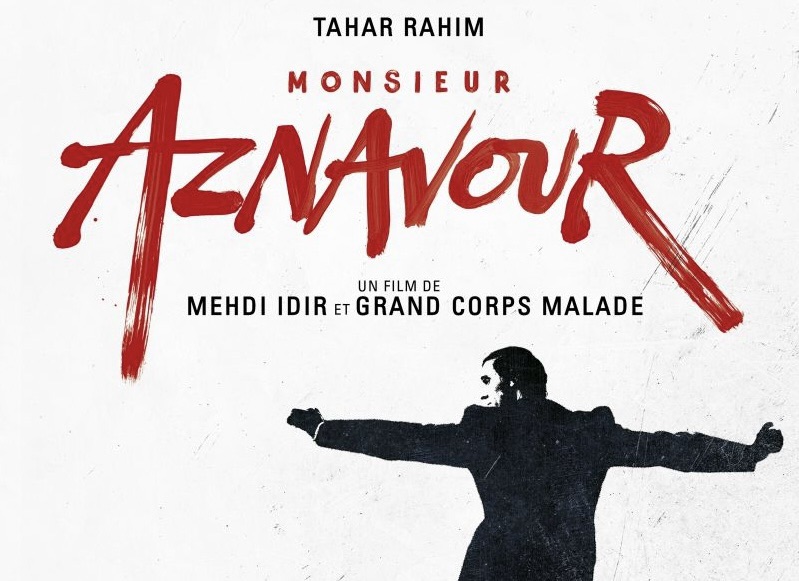 Extrait de l'affiche : le nom de Tahar Rahim en tête, le titre, et un dessin de M. Aznavour en noir et blanc, le dos tourné.