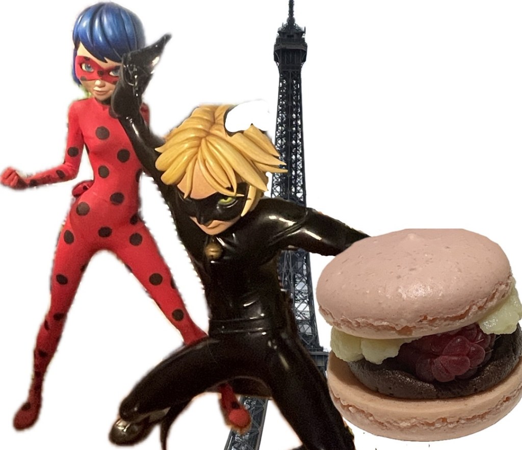 L'IA a été utilisé pour couper les statues de Ladybug et Chat Noir de la série Miraculous, la Tour Eiffel et un macaron Saint-Valentin de leurs photos originales pour faire un collage. Le macaron est rose, et garni de couches de crème pâtissière et de ganache au chocolat avec une framboise entière, une création de Justin Busch.
