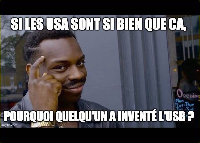 Mème avec un type qui tape sur le front en pensant « Si les USA sont si bien que ça, pourquoi quelqu'un a inventé l'USB ? »