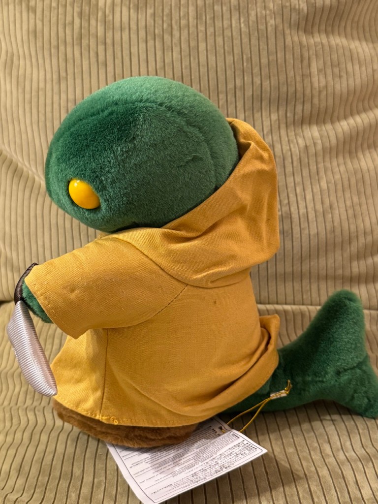 Tomberry vu du côté, qui permet de voir qu'il a une queue comme un lézard.